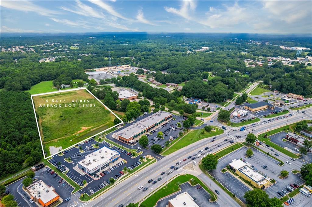 Additonal 1 acre with retention pond available deed book 12253, page 262. Parcel: 5160281 (4116 Atlanta Hwy) (Trc1 pecan Rd)
