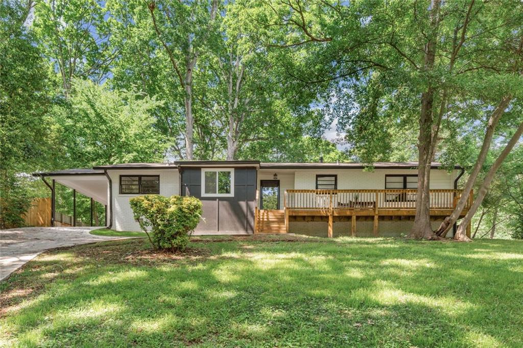 || ALL BRICK RANCH || || CORNER LOT || || NEW ROOF || || NEW HVAC || || NEW KITCHEN || || NEW BATHS || || NEW DRIVEWAY || || NO HOA & NO RENT RESTRICTIONS ||
** What You’ll See **
Perched on a CORNER LOT with a BUNGALOW FEEL, this UPDATED ALL BRICK RANCH makes a strong first impression. Inside, HARDWOOD FLOORS flow through a bright open layout centered around a modern WATERFALL ISLAND and STAINLESS STEEL APPLIANCES. The NEW KITCHEN and RENOVATED BATHS shine with sleek finishes, while the NEW DRIVEWAY, NEW DECK, and FLAT BACKYARD offer both curb appeal and outdoor space for relaxing or entertaining.
** What You’ll Hear **
Enjoy the quiet hum of a NEW HVAC SYSTEM, the rustle of leaves in the trees, and the sound of friends gathering on the deck. Without an HOA, there’s no noise from restrictions—just freedom. Yet when you want the city’s energy, you're minutes from Emory, CDC, CHOA, and the buzz of Toco Hills.
** What You’ll Feel **
From the moment you step inside, feel the comfort of thoughtful updates. The NEW ROOF, HVAC, kitchen, and baths give peace of mind, while natural light and fresh air flow throughout the elevated space. With NO HOA & NO RENT RESTRICTIONS, you’ll feel the freedom to live or invest on your terms.
** What You’ll Experience **
A quiet retreat in the heart of it all. Whether sipping coffee on the NEW DECK, hosting friends in the open-concept layout, or exploring local dining and shopping, life here is low-maintenance and high-reward. With a TRANSFERABLE HOME WARRANTY, this move-in-ready home offers ease, comfort, and flexibility from day one.