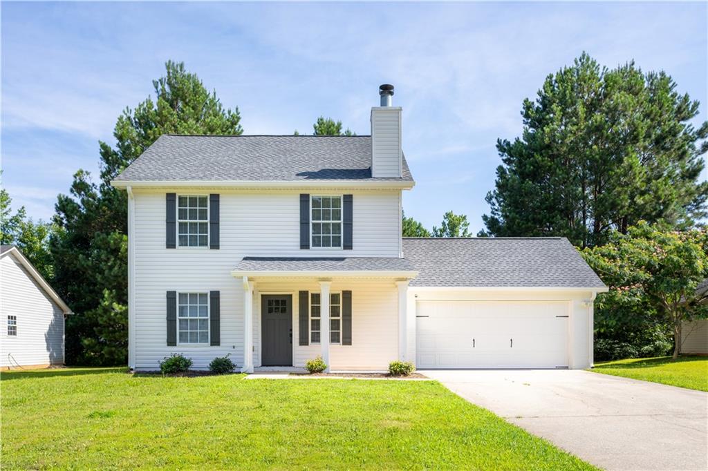 This house is an updated, move-in ready home where peace of mind meets comfort. Tucked on a quiet street with a spacious yard and inviting curb appeal, this two-story home checks all the boxes for effortless living. From the moment you step inside, you’ll notice the fresh finishes and turnkey convenience. Every inch has been thoughtfully updated including a new roof, new HVAC, new hot water heater, new flooring, new interior and exterior paint, making this a truly low-maintenance opportunity.
The main level offers a smart flow and floorplan. The living room is centered by a classic fireplace and natural light, creating a welcoming space to relax or entertain. Continue through to the dining area, perfectly positioned between the updated kitchen, complete with granite counters, subway tile backsplash, and stainless steel appliances and access to the backyard patio, ideal for weekend grilling or evening unwinding.
The layout includes a main-level bedroom with an adjacent full bath, perfect for guests, in-laws, or a private home office. Upstairs, the generous primary suite features vaulted ceilings, a walk-in closet, and a fully renovated en-suite with granite counters and a tiled walk-in shower. Two additional bedrooms and a full bath complete the upper level, offering comfort and flexibility for everyone.
A spacious two-car garage, ample storage, and a large backyard round out this value-packed home. Whether you're starting fresh as a homebuyer or looking for a worry-free investment, this one delivers ease, style, and function in equal measure. Taxes DO NOT reflect Homestead Exemption