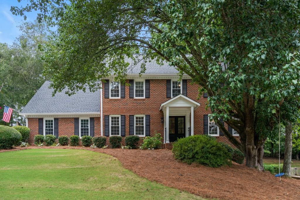 Impeccable Walton home in sought after Jacksons Creek offers an extraordinary level of quality and design producing a fresh outlook on traditional living. Distinctive upgrades include extensive millwork throughout, fresh interior paint, designer lighting, and custom double front entry door. Fantastic open floor plan with an abundance of natural light. Main level living space is anchored by an expansive eat-in kitchen that opens to the fireside great room. Beautifully appointed kitchen features white cabinetry, stainless steel appliances, center island, granite countertops, tile backsplash, and walk-in pantry. Separate breakfast room opens to screened deck with pergola overlooking fenced-in pool and spacious yard. Main level complete with shiplap dining and office/playroom. Upstairs boasts an elegant master suite including separate spa shower/whirlpool tub, double vanity, and expansive walk-in closet. Three large secondary bedrooms PLUS renovated bonus room above the garage complete the spacious upper level. Finished terrace level offers large rec room and game room with 5th bedroom and full bathroom. Active HOA with swim/tennis, lake, and clubhouse. Prime location to Roswell Boardwalk, Azalea Park, Chattahoochee River, top-rated schools, and shops/restaurants.