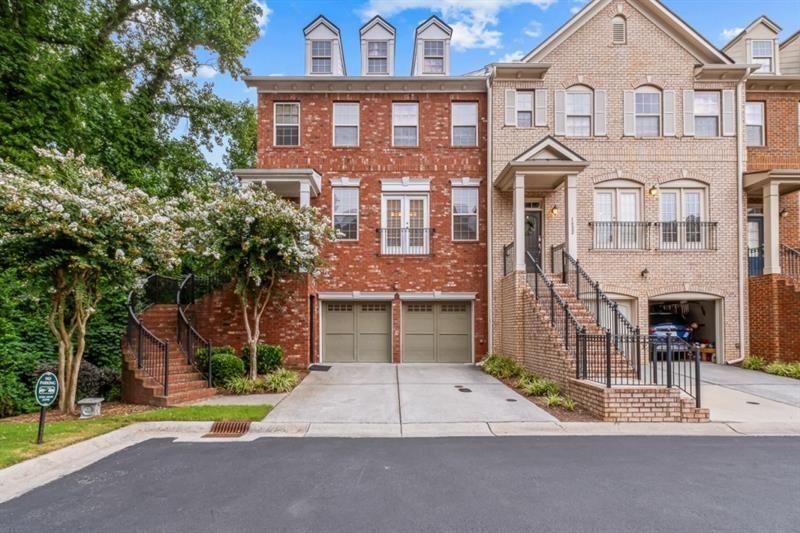 Discover one of the largest and most private residences in this sought-after neighborhood, thoughtfully appointed with extensive builder upgrades and custom finishes throughout. The open-concept main level showcases a double-sided fireplace, bespoke built-ins, and a tranquil deck with serene wooded views. The expansive primary suite offers peaceful vistas, a spa-inspired bath, and a spacious walk-in closet. Two additional bedrooms and a conveniently located laundry room complete the upper level. The terrace level features a private guest suite with its own deck, while the lower level is designed for entertainment, boasting a home theater, wet bar, and full bath. Additional highlights include a two-car garage, generous storage, and access to the community pool. This residence truly offers the perfect balance of comfort, privacy, and sophistication.