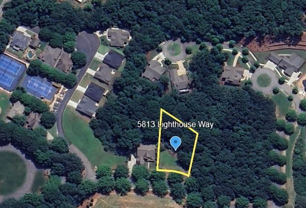 You’ve found your chance to secure one of the final lots in Marina Bay! This fantastic half-acre lot offers plenty of room and is a quick, 2-minute walk to the pickleball courts. Plus, an optional Marina Bay Boat Slip License is available for an additional $95,000.
We have a beautiful home plan that checks all the boxes selected for this lot. The home design is created by one of Hall County's premier custom homebuilders - Harcrest Homes - This home design is a timeless modern open concept with space for a private swimming pool in the backyard. Ask us about sending you the Hampton Home plan for this lot.
This lot features gentle topography, making it easy to build your dream home. Its beauty is perfectly complemented by the natural splendor of Marina Bay's tree-lined streets and lush amenities, all within a gated community of just 251 families.
Annual HOA fees are $3,000, with an additional $500 for the boat slip maintenance. Marina Bay homes boast timeless architecture and access to award-winning resort-style amenities, including:
A saltwater pool with a cabana and outdoor fireplace |
A fitness center |
A 14,000-square-foot clubhouse |
A 196-slip marina |
Tennis and pickleball courts |
Sidewalks and parks |
A tot lot.
Our community also has architectural controls and an active HOA with professional management and year-round activities.
- The Best of Lake Life -
Marina Bay offers the perfect blend of year-round fun and serene tranquility. You’ll find a warm, welcoming community of lake-life friends here. Our family has had more lake time than we ever imagined! Living on the North Shore of Lake Lanier also gives you easy access to the exciting North Georgia Mountains lifestyle.
Come be a part of our wonderful community! There's something for every member of the family, and our professionally managed HOA helps us maintain an active calendar of fun activities throughout the year.
Imagine hopping in your golf cart and being on the lake in five minutes. Or, better yet, enjoying the resort-style saltwater pool with its waterfall and beach entry, or getting in a great workout at our full fitness gym. You'll love evening walks on the tree-lined streets and chatting with the friendly families who adore their lake lifestyles here in Marina Bay.
