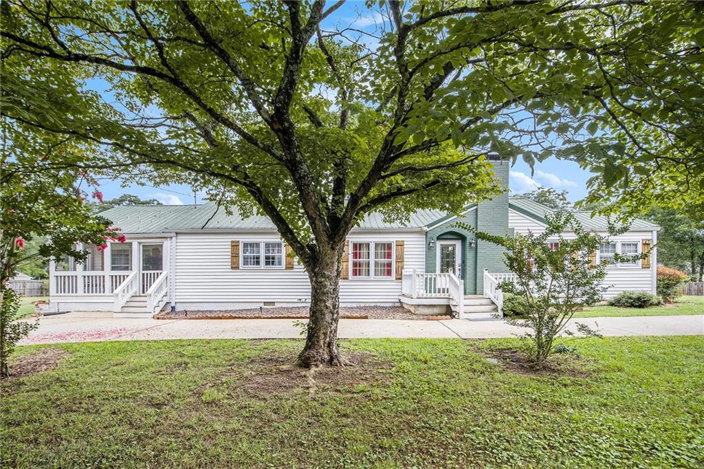 Step back in time and experience the warmth and character of this charming 1950s home, perfectly situated on just under 3.5 serene acres. From the moment you arrive, you’ll be captivated by the peaceful setting, mature trees, and the property's crown jewel—a private fishing pond that's perfect for quiet mornings or entertaining guests.
This classic home offers timeless appeal with vintage details throughout, while also providing ample space for modern living. Whether you're relaxing on the porch or sunroom, casting a line in the pond, or exploring the spacious grounds, you'll feel like you've found your own private retreat.
Ideal for nature lovers, hobby farmers, or anyone seeking a blend of nostalgia and nature, this unique property offers endless potential. There's room to garden, host gatherings, or simply enjoy the peace and quiet of country living—all just a short drive from town.
Don’t miss this rare opportunity to own a piece of countryside charm with all the right touches.