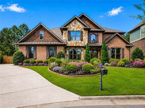 Homes For Sale - 1335 Whisper Cove Drive<br/> Buford, GA 30518