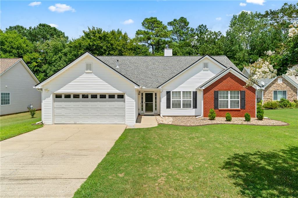 Immaculate home in this sought-after Community of Harbins Plantation. Inside, you'll appreciate the beautiful hardwood floors, high ceilings, and detailed finishes. With windows galore, the main living spaces are enveloped in light and comfort. This home is perfect for entertaining. The kitchen is the heart of the home and has enough room for multiple cooks - complete with a gas cooktop, solid-surface counters, SS appliances and tiled backsplash. The dining room is connected to the kitchen making it convenient to go back and forth between. The master bedroom is connected to a large walk in closet and a beautiful master bath with a double vanity, separate shower and tub, and tiled floors. This home also includes two generously-sized secondary bedrooms and 1 full bath. For outdoor entertaining, you'll delight in the large patio and fenced in backyard with a play set that is great for kids!