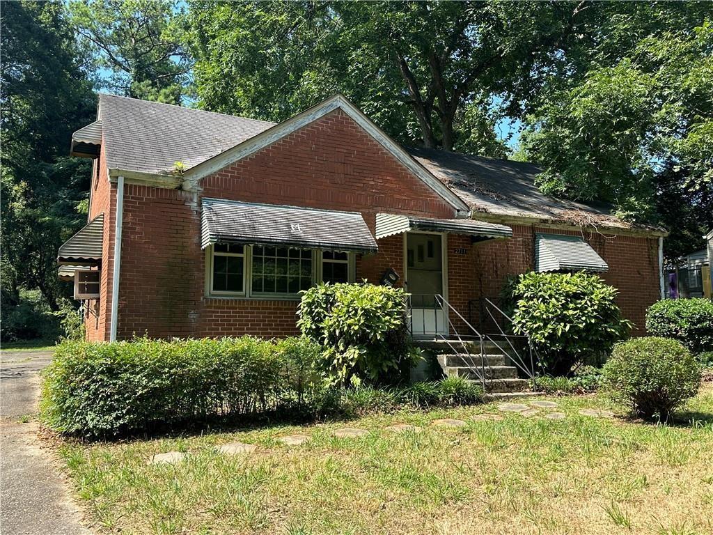 This cute brick bungalow is in need of complete renovation or tear it down to build your dream home. Home has been prepped for tear-down with asbestos professionally remediated. Home can easily be restored and expanded using the existing permanent stairs to the already partially finished attic. Lot is flat and well suited for new construction. Home is not currently habitable and will require a cash buyer.