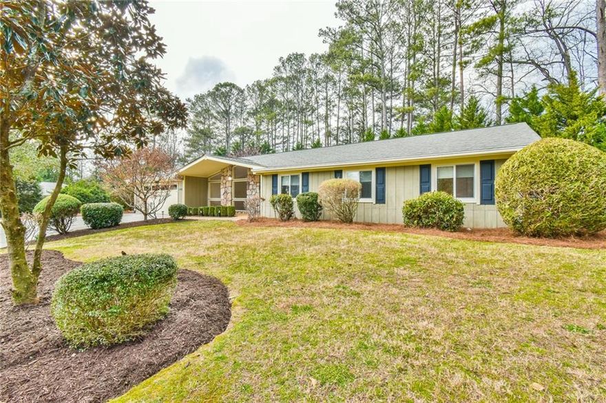 Step-less Ranch tucked away on a quiet cul-de-sac and just a short stroll to Eastside Elementary. This beautifully updated home offers an oversized primary suite with a triple tray ceiling, transom windows, and a light-filled, airy feel. The kitchen and bathrooms have been tastefully renovated, complemented by high-end Balhi shades, newer windows, and just-refinished hardwood floors. Freshly painted in crisp white, the interiors are bright and inviting, with a vaulted glass front that floods the home with natural light. You will also find thoughtful touches throughout including a large laundry room, garage storage, and a walk-in pantry big enough for all your Costco runs. The cozy breakfast nook with built-in bench seating overlooks the backyard and patio, perfect for morning coffee, weekend brunches, or evening get-togethers. All this plus zoning for Dickerson Middle and Walton High School, one of Georgia’s top-ranked schools.