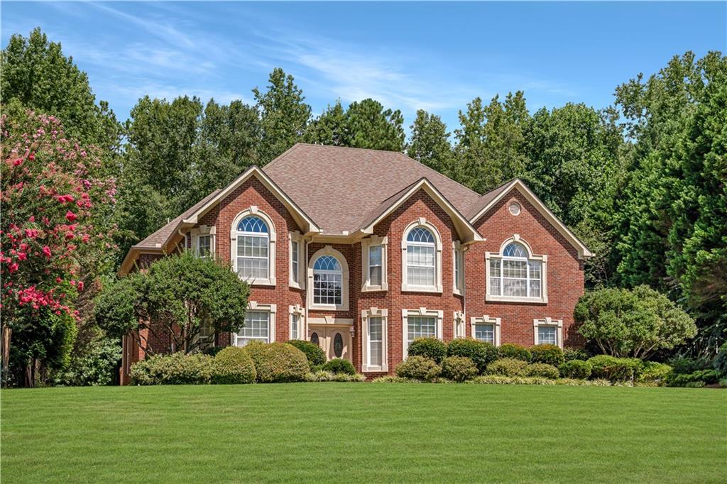 4 Sided brick gem with rare Dual Primary Suite Home in highly sought after neighborhood! They just don't make them like this anymore!! Step inside your new home...you'll be welcomed by soaring ceilings in the foyer and family room that fill the space with natural light. The chef's kitchen is a standout feature with luxury KitchenAid appliances, a prep sink, expansive countertops, and ample seating-perfect for both everyday living and entertaining. One of the home's most unique features is its two full primary suites, including one on the main level-ideal for multigenerational living or long-term guests, which has a cozy sitting area complete with a fireplace. Upstairs, you'll find the second Primary suite adjoined with a spacious bathroom. Down the hallway you will find three additional spacious bedrooms and a thoughtful layout designed for comfort and privacy. Recent updates include:Fresh interior paint (2024), Both HVAC units under two years old, Epoxy-coated garage floors, and a spacious, private lot with room for a pool! Your new home is in a well-maintained neighborhood with an OPTIONAL HOA!! This immaculate home is move-in ready and priced for a quick sale. There has only been one owner, and this home is very well taken care of! Don't miss your opportunity-schedule your showing today! Apply with Preferred lender Myron Fears (Umortgage) for a lender credit of up to 1%. No blind offers or creative financing per seller's request.