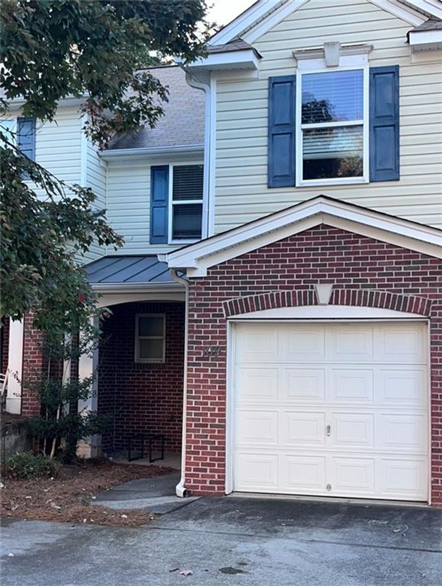 Great investment opportunity for savvy buyer with a little patience.  This charming 3-bedroom, 2.5-bath townhome  which is conveniently located near shopping, amenities and interstate. This home features open floor plan, laminate flooring on the main level and a stylish kitchen with granite countertops and rich cherry wood cabinets. Upstairs, you’ll find generously sized bedrooms, including a spacious owner’s suite with vaulted ceiling, ceiling fans and cozy carpet flooring. The en-suite bathroom offers a relaxing garden tub , separate shower and vanity area. All terms of the agreement are subject to 3rd-party bank approval.