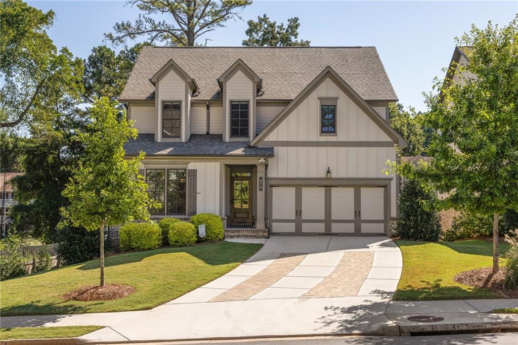 Thoughtfully designed and beautifully upgraded, this newer construction home in Avondale Estates blends modern style, custom finishes, and flexible living spaces, all set on a quiet cul de sac. Step inside to an open concept main level where the kitchen flows effortlessly into the dining and living areas, creating the perfect setting for everyday life and entertaining. Sunlight pours in through windows with treetop views, while a gas fireplace flanked by built in bookshelves anchors the living space. The chef’s kitchen is a true centerpiece, featuring a large center island with granite countertops, walk-in pantry, coffee bar, stainless steel appliances, and abundant storage. The dining room, with its coffered ceilings, provides an elegant backdrop for holiday gatherings, while the spacious screened porch plumbed for a gas line and ready for a fire pit is perfect for enjoying crisp fall evenings or hosting friends. The main floor primary suite is a serene retreat, complete with a soaking tub, glass enclosed tile shower, and walk in closet. Its quiet location makes it ideal for unwinding after a busy day. A guest bedroom with its own never used ensuite ensures comfort and privacy for visitors. Upstairs, three additional bedrooms and a flexible space offer room for a home office, media lounge, or playroom for the kids. One oversized bedroom includes a private ensuite, while the other two share a hall bath. The unfinished basement is a blank canvas, with plumbing in place for a full bath and a fireplace, the lower level offers an additional 1600 square feet and is ready to become an in-law suite, guest quarters, home gym, or even an income producing space. Step outside to the backyard, a peaceful retreat that comes alive with every season. The patio off the basement invites morning coffee with the sunrise, evening cocktails under the stars, or weekend gatherings with friends and family. There is plenty of space for kids to play, pets to roam, or your garden to flourish. Equipped with Rain Bird irrigation and HOA lawn maintenance, this outdoor haven blends relaxation and entertainment effortlessly. Tucked in the welcoming Avondale East neighborhood, you are less than a mile from the charm and energy of historic downtown Avondale Estates, including restaurants, shops, breweries, community events, and the new Town Green. Enjoy nearby parks, the PATH, Stone Mountain Trail, DeKalb Farmers Market, top rated schools, and easy access to Downtown Decatur, Emory, CDC, and major highways.