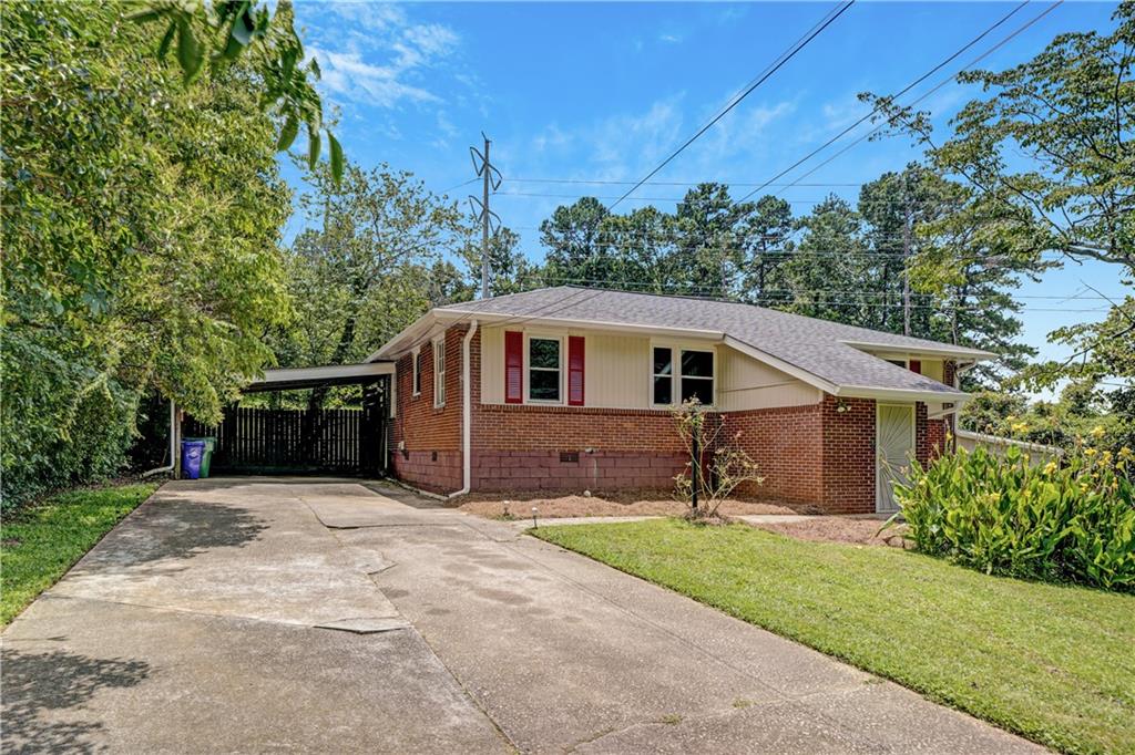 Welcome to 1073 Willivee Dr, Decatur, GA 30033 where space, style, and flexibility meet in one of Decatur’s most sought-after neighborhoods. This beautifully updated three bedroom, three full bathroom home offers more than 2,000 square feet of versatile living, including a complete in-law suite with private entrance, full kitchen, laundry, and living space — ideal for multigenerational living or income-producing rental potential.
Step inside to find gleaming hardwood floors, brand new carpet, and fresh updates throughout. Enjoy the convenience of two spacious living rooms, a formal dining room, and a bright, upgraded kitchen featuring granite countertops and all-new stainless steel appliances.
The primary suite is a true retreat. It is complete with a dedicated office space, ensuite bath, and access to a huge private porch overlooking the fully fenced and landscaped backyard.
Other highlights include a 2-car carport, a fully fenced yard perfect for pets or play, covered access into home through gate and private small back deck and proximity to the very best of Decatur. You're just steps from Medlock Park, the South Peachtree Creek Trail, Dekalb Tennis Center and less than five minutes from Emory, CDC, Toco Hills dining & shopping, Downtown Decatur, and the exciting new Lulah Hills development.
This home is the perfect blend of comfort, convenience, and opportunity. Don’t miss your chance to make it yours!