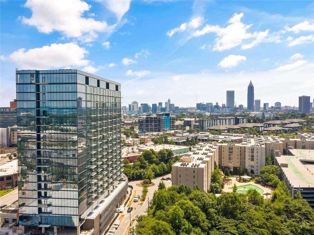 Corner unit with oversized private balcony in one of West Midtown’s premier luxury high-rises—available 9/1 for rent, lease purchase, or sale. Appointments required; tenant occupied until 8/31.
This light-filled 2BD/2BA condo features floor-to-ceiling windows, 10'+ ceilings, and unobstructed views of Downtown, Midtown, and Mercedes Benz Stadium. Interior includes modern finishes, stainless steel appliances, LED backlit mirrors, dual vanities, and two assigned garage parking spots. Comes with a transferrable rental permit—extremely limited and valued over $50K.
Building amenities include 24/7 concierge and security, heated pool and spa, indoor dog park and pet spa, full gym, resident lounge with kitchen, game room, conference space, outdoor grilling stations, fire pits, dry cleaning services, and package lockers. Rent covers trash, gas, security, gated parking, and full access to amenities.
Prime location near Mercedes Benz Stadium, Georgia Tech, Grady & Piedmont Hospitals, Westside Provisions, BeltLine, and more. Rare opportunity to rent or own in one of Atlanta’s most in-demand high-rise communities.
Requires: 40x rental ANNUALLY. 700+ credit. No evictions. No criminal history.