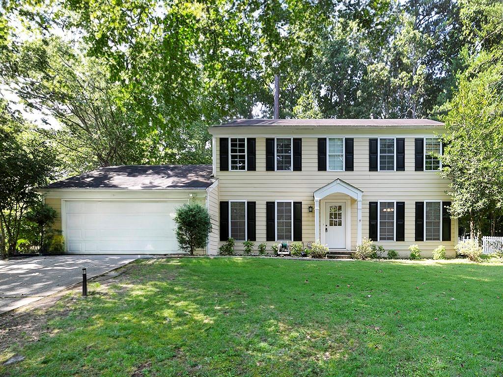 Welcome to this beautifully updated traditional home located in the heart of East Cobb. Zoned for the highly acclaimed Walton High School, this spacious and light-filled 3-bedroom, 2.5-bath residence offers modern comfort, timeless charm, and unbeatable convenience. The home features a flowing floor plan with an inviting foyer, formal living and dining rooms, and an expansive family room with a cozy wood-burning fireplace. The beautifully renovated kitchen boasts stainless steel appliances (including a brand-new gas stove), generous counter space, and a bright breakfast nook that overlooks the private backyard. Upstairs, the primary suite includes a walk-in closet and a private en-suite bath with dual vanities. Two additional bedrooms share a hall bath, and each room offers ample storage and natural light. BRAND NEW carpet in all bedrooms. Outdoor living is a dream with a newly landscaped yard and a spacious deck perfect for entertaining or relaxing. The lot provides plenty of space to enjoy the outdoors—all professionally maintained, as landscaping is included in the rent and paid for by the owner. Washer and dryer are included, and the TV in the primary bedroom will stay with the property for tenant use. Home is ready for immediate move-in. TESLA charger in the two car garage. Don't miss this opportunity to live in one of East Cobb’s most desirable SWIM/TENNIS neighborhoods!