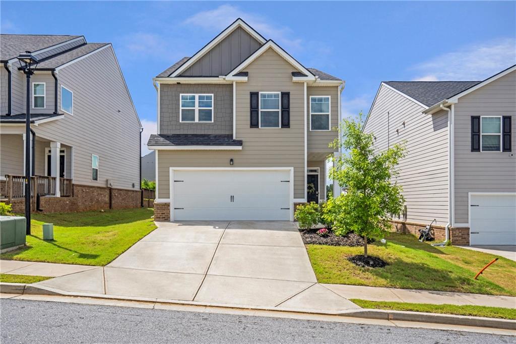 This better than New, Stunning home has all the wow factors! lots of bells and whistles and custom features that a new home doesn't have! From the moment you walk in to the nice long foyer area to the family room with a cozy- floor to ceiling shiplap fireplace and lots of natural daylight, you will be Wowed! Large dining area with Custom lighting. Incredible open floor plan -great for entertaining! Gourmet- chefs' kitchen with plenty of white cabinets, Granite Counter tops, Back splash, very large island Dressed with Custom Shiplap and Large walk-in pantry with decorative board and batten! Gleaming Hardwood Like floors on main level !Large owner suite with sitting area, Spa like Bath room with tile surround and Separate Shower! Additional Bedrooms generously Sized with Board and Batten wall! Large Covered Patio and fenced backyard. Dual Zone lawn irrigation system, window blinds and garage door opener. Plan master community of Twin Lakes with amazing amenities pool, Clubhouse, Fitness Center, Playground, Dog Park, Lakeside Pavilion, and Walking Trails to bike or stroll around the serene on -site lakes ! Minutes from Château Elan winery and golf course and Much More ! 100% financing available