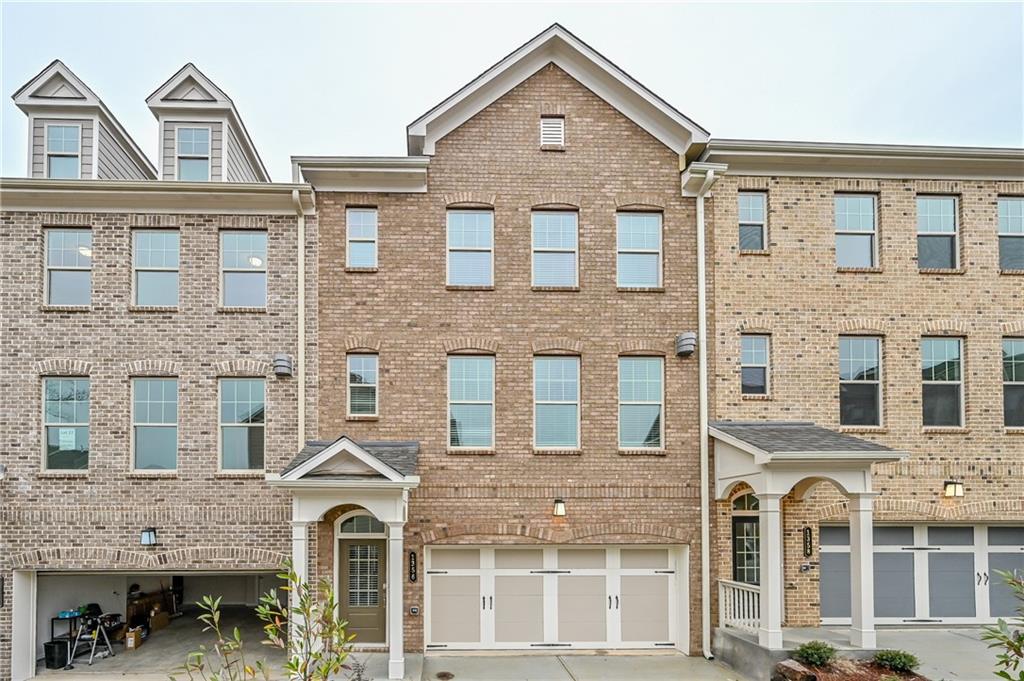 Almost brand new, move in ready townhome with 2 car garage. Gated, quiet swimming pool community tucked into convenient location near interstates, restaurants, hospitals and schools. This 4 bedroom, 3.5 bath townhome has lots of storage and natural light throughout. Hardwood floors throughout. Primary suite features bath with double vanity, huge shower and deluxe bath with large closet. Lower level has bedroom with lots of closet space and full bath. Washer/ Dryer, blinds and refrigerator included. Backyard has pretty trees and fence to nice neighborhood.