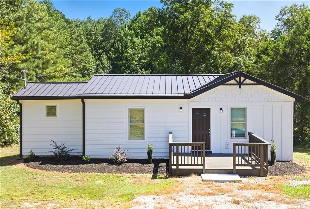 Welcome to this beautifully renovated 3-bedroom, 2-bath home on a generous 1.3-acre lot in
Winston, GA. Featuring a modern open floor plan, this residence is ideal for both everyday living
and entertaining. The brand-new kitchen boasts sleek quartz countertops, custom cabinetry, and
ample space for gatherings. Every detail has been thoughtfully upgraded—new electrical,
plumbing, HVAC, septic system, flooring, and fully remodeled bathrooms—all completed with
county approval for peace of mind. The spacious lot offers room to create your own outdoor
retreat, whether for gardening, recreation, or enjoying quiet evenings. With its convenient
location, you’ll appreciate easy access to I-20, shopping, and dining, while still enjoying the
privacy and space of a large homesite. This turnkey property blends comfort, style, and
function—move-in ready and designed to be enjoyed for years to come.
