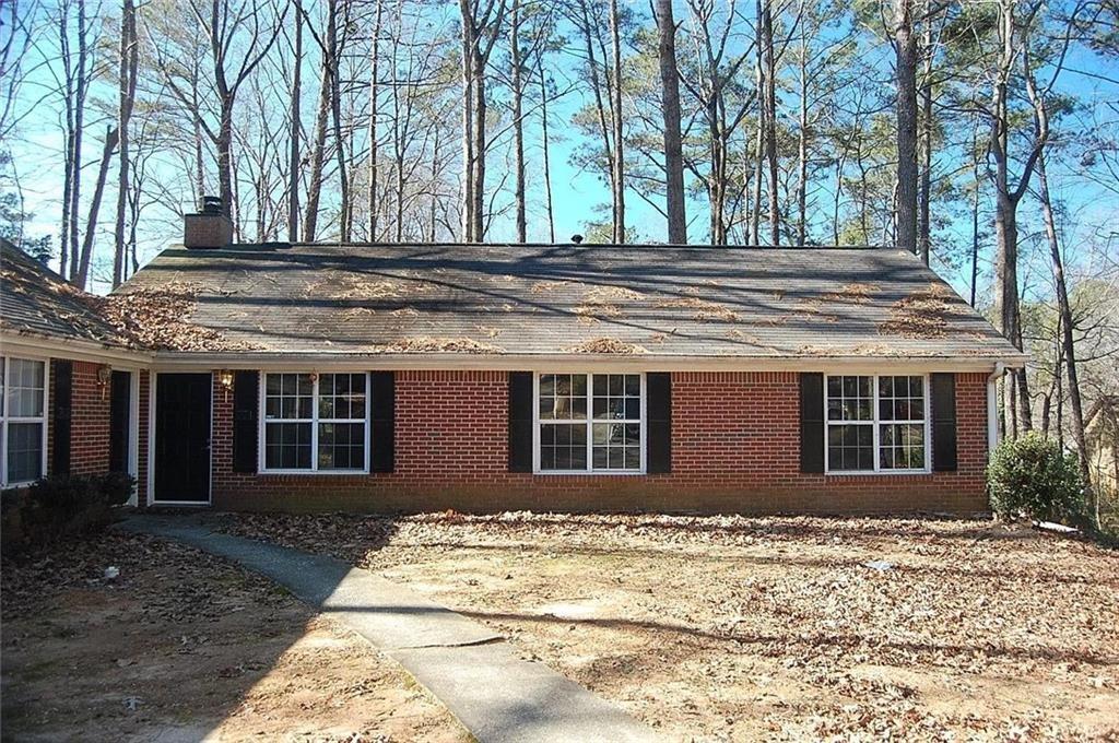 This three bedroom two full bath ranch style brick home is a rare find this close to downtown Woodstock with easy access to I-575. A generous kitchen with all white appliances and a breakfast nook, laundry room and sliding door to the patio. Large unfenced backyard with a storage building included.