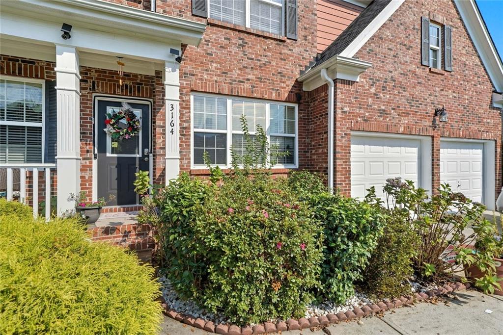 Stunning 3-level home in a sought-after Gwinnett County neighborhood with top-rated schools! This 6-bedroom, 2-bonus room, 4-bathroom home is perfect for families and extended living. The fully finished basement includes 1 bedroom and 2 bonus rooms currently used as additional bedrooms, a full kitchen, and full bath—ideal for in-laws or guests. Main floor features a bright eat-in kitchen, formal dining room, living room, and elegant formal sitting room. Upstairs are four bedrooms including the primary suite, which boasts a massive walk-in closet that’s nearly a room on its own! Recent updates include HVAC (2 years), water heater (1 year), and roof (3 years). The property has outdoor space with potential for gardening or raising chickens, plus a 2-car garage and ample storage. A must-see!