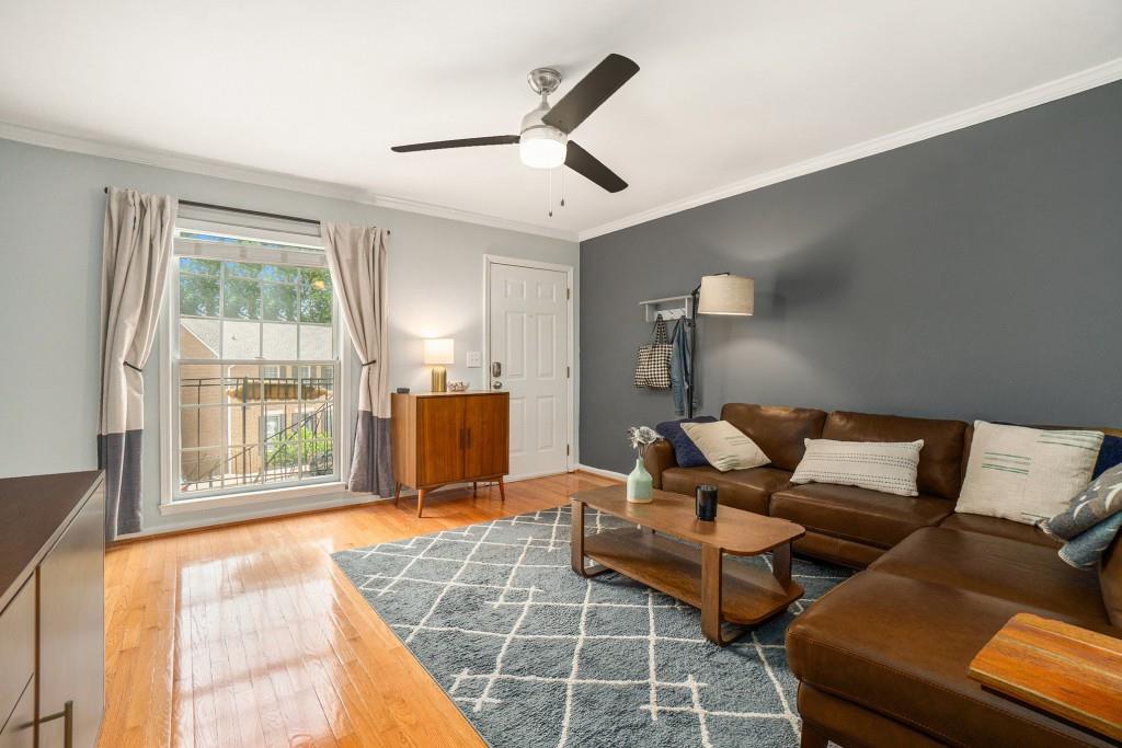 Welcome to one of the most unique and sought-after units in coveted Carlyle Square an updated, sun-soaked condo in the best building of this gated West Midtown community. This rare two-story layout is entirely above ground (no basement levels here!) and is one of the few two-story units featuring a private screened porch a true outdoor retreat that's exceptionally rare in the community. Enjoy two separate entrances: one from the front stairwell and one directly from the lush, landscaped courtyard. Inside, thoughtful upgrades shine at every turn. The renovated kitchen boasts high-end vinyl flooring, granite countertops, glass-front cabinetry, a deep-mount sink, and sleek new hardware. The open-concept living and dining space feels bright and airy, centered around French doors that lead to the screened porch perfect for morning coffee, evening cocktails, or letting the pup out for a quick walk. A convenient half bath completes the main level, while upstairs you'll find two spacious bedrooms and a beautifully renovated full bathroom with subway tile, white Italian marble flooring, and a custom vanity. Additional highlights include new carpet, fresh paint, updated lighting and ceiling fans, and a deeded storage unit. Community perks abound with a saltwater pool, recently renovated fitness center, and beautifully maintained grounds with mature trees. Located in the heart of thriving West Midtown, you're just minutes from Publix, Fellini's, DAS BBQ, Howell's, Mr. C's, and pocket parks along the Northside BeltLine Trail. Exciting improvements are underway nearby, including the upcoming Upper West Market opening this year, studies to enhance Collier Road for biking and walking, and expanded trail access connecting the Westside to the BeltLine and surrounding neighborhoods. All this just minutes from Georgia Tech, Piedmont Hospital, Buckhead, Atlantic Station, Bobby Jones Golf Course, and downtown. Come experience the perfect blend of style, comfort, and convenience in one of Atlanta's most vibrant and connected communities.