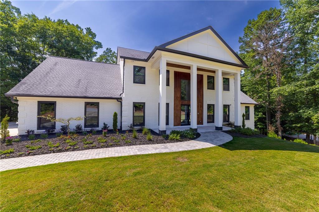 Introducing 4 Bentley Trace Manor — a jaw-dropping masterpiece in one of Atlanta’s most coveted and private enclaves, where ultra-modern design, world-class luxury, and timeless sophistication come together in perfect harmony.
Step through the massive double-door entrance onto a gorgeous tiled entryway that flows into a dramatic two-story foyer crowned by a breathtaking crystal chandelier — the ultimate first impression. Throughout the main level, beautiful hardwood floors add warmth and elegance, setting the stage for the exquisite design details found in every corner.
At the heart of the home, the chef’s kitchen dazzles with sleek, top-of-the-line appliances, an oversized quartz island, striking designer backsplash, pot filler faucet, and a chic serving area accented to perfection. Host unforgettable dinners in the glamorous formal dining room under a show-stopping light fixture, relax fireside in the separate family or living rooms, and step right out onto your private deck — the perfect spot to sip morning coffee, unwind with a glass of wine, or simply soak in the tranquility of your surroundings.
This estate offers a total of 6 bedrooms and 5.5 baths, with smart, flexible living:
– Main level: 1 bedroom, 1.5 baths (including a luxurious owner’s suite with spa bath, double vanities, freestanding French tub, glass shower, and modern touch-light mirrors for the perfect glow)
– Upper level: 4 bedrooms, 3 baths, including a second owner’s suite with another lavish spa retreat featuring double vanities, a freestanding tub, separate shower, and touch-light mirrors for a sleek, modern finish
– Terrace level: 1 bedroom, 1 bath, plus a massive second living area with fireplace, flex room ideal for a media space, gym, or yoga studio, a wet bar with sink and dishwasher, and a custom wine cellar
Sitting on a pristine 1-acre private cul-de-sac lot, the outdoor experience is just as impressive, with multiple porch areas and that inviting deck designed for year-round entertaining and relaxation. A two-car garage completes the picture of convenience and style.
Beyond the gates, you’re just moments from the best of Atlanta: luxury shopping at Phipps Plaza and Lenox Square, fine dining at Buckhead Village District, premier golf at Cherokee Town & Country Club, the greenery and concerts at Chastain Park, and easy access to Atlanta’s top private schools, arts, and nightlife.
This is more than a home — it’s a bold, sophisticated statement of success and style. Welcome to 4 Bentley Trace Manor — where Atlanta’s elite lifestyle becomes your everyday reality. Are you ready?
***This property is eligible under the First Look Initiative. All Owner Occupant offers will be responded to after 7 days on the market and Investor offers will be responded to after 30 days. However, all offers can be submitted during the First Look period. - All offers must be entered through propoffers site
- An offer management fee of $200 (plus sales tax, where applicable) is charged by Pyramid Platform in connection with the use of Propoffers site. This fee will be paid at closing from the Broker representing the buyer as selling agent or transaction broker.
- Subject to seller addendum
- For financed offers EMD to be 1% or $1000 whichever is greater and for cash offers EMD to be 5% or $5000 whichever is greater.
- All offers are subject to OFAC clearance.
- A viewing release must be signed and returned to our office before showing this property. ***
