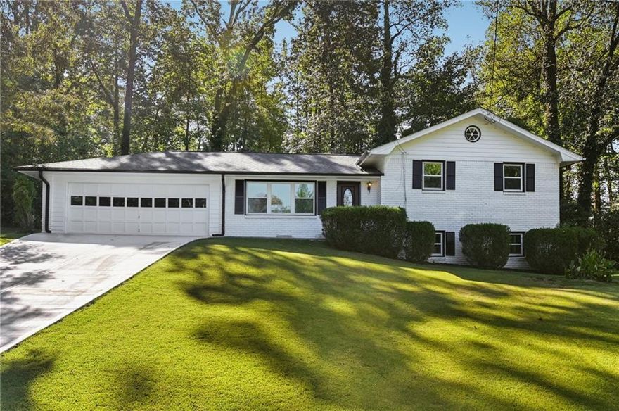 Located in a prime area of Marietta, near the intersection of Highway 120 and Johnson Ferry Road, this property offers great schools, and is close to restaurants, and shopping.

This is an excellent opportunity to own a fantastic home or make a smart investment in Marietta.

This home offers three levels with minimal stairs between them. Inside, much of the property has been recently painted. The main level features a family room, dining area, and an open kitchen with granite countertops and new stainless steel appliances. The upper level includes three bedrooms and one and a half baths, while the lower level provides a spacious living area, a bedroom, a full bath, and an outside entry (the lower level provides an opportunity for a private primary suite!).

The home has been meticulously maintained and recently updated with newly painted brick, a new driveway and walkway, a new roof, and a new HVAC system. Newer windows and glass sliding door add to its appeal. The sale also includes a new clothes washer and clothes dryer.

Don't miss this great opportunity!