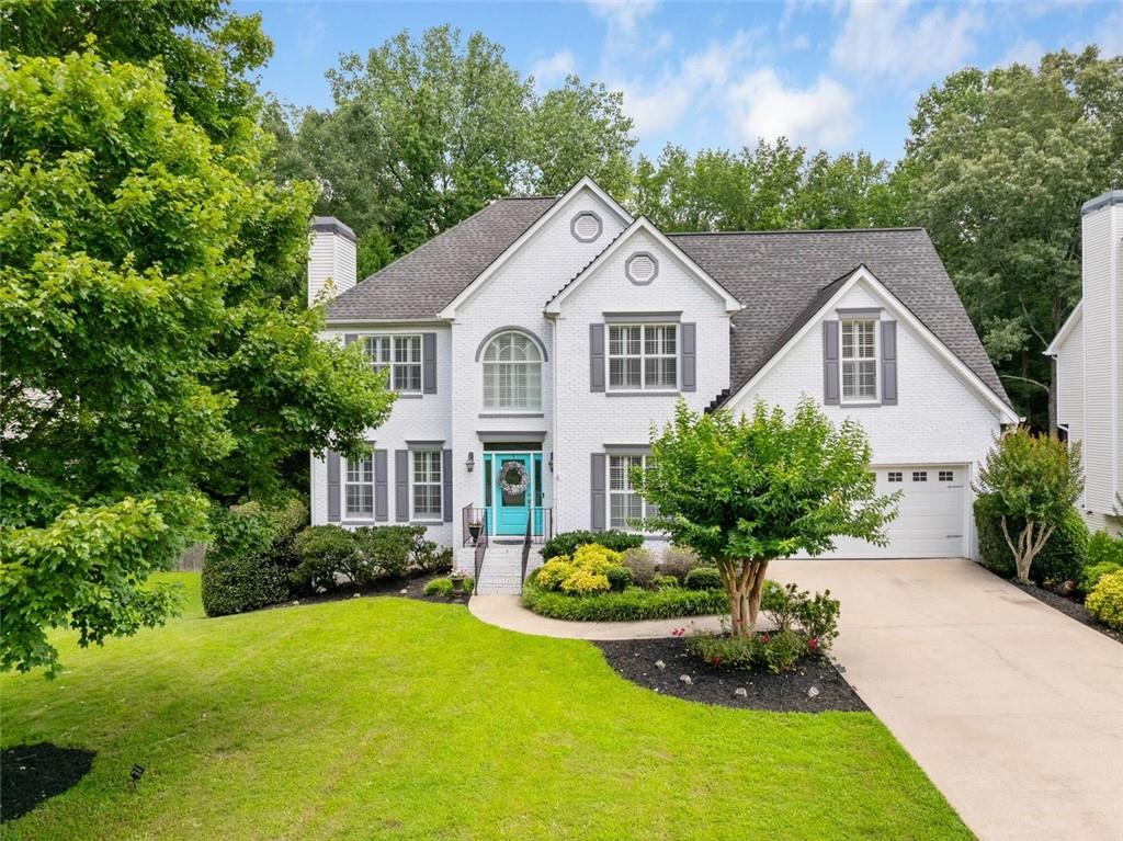 THIS WEST COBB EXECUTIVE HOME IS OFFERED WITH AN ASSUMABLE 2.5% FIXED MORTGAGE LOAN TO QUALIFIED BUYERS*
Welcome to 1567 Vine Leaf Drive, an elegant colonial-style residence in West Cobb that beautifully blends timeless design with modern comfort. Situated on a generous 0.36-acre lot, this 5-bedroom, 3.5-bathroom home spans 3,586 square feet of thoughtfully crafted living space, perfect for both lively gatherings and everyday living.
As you enter through the stately front door, you are immediately greeted by a soaring two-story grand foyer and sweeping staircase, setting the stage for the home’s classic charm. Flanking the foyer, formal and intimate parlor sits to your left with a working fireplace and an elegant formal dining room to your right. Natural light pours through new plate glass windows into the spacious family room, seamlessly connected to an expansive chef’s kitchen featuring a central island, abundant cabinetry, and updated appliances. Smart Home features dual Nest thermostats, ADT Security System and smart lighting. A fifth bedroom, currently used as a private office/den, convenient pantry, laundry area, and elegant half bath complete this functional and inviting main level.
From the heart of the home, gaze out over your own private backyard oasis. The large Trex deck offers the perfect place for morning coffee or evening grilling, while the sparkling pool, lush landscaping, and custom fire pit create a resort-like atmosphere designed for relaxation and entertainment. In addition, homeowners can benefit from the energy-efficient solar panel display neatly integrated on the roof that provides additional electricity for the home.
Upstairs, the luxurious owner’s suite provides a true retreat, complete with a spa-inspired ensuite bathroom featuring a jacuzzi tub, a five-head shower with automated temperature and pressure settings, and expansive walk-in custom closets. Three additional bedrooms share a well-appointed bathroom, ensuring comfort for family and guests alike.
The fully finished terrace level expands the home’s versatility, offering spaces tailored for both fun and relaxation. Discover an open game and playroom, cozy reading nooks, and a private home gym. For the hobbyist or craftsman, a rustic workbench area provides the ideal spot for carpentry or creative projects.
Every detail of this home is designed for comfort, elegance, and enjoyment—indoors and out. Located in the desirable Powder Springs neighborhood, this property offers the best of suburban living with easy access to schools, shopping, and dining.
(*VA Home Loan assumption does not require military service applicants and buyer does not need to be a veteran, but needs to qualify with a minimum 620 credit score, 41% Debt-To-Income Ratio; inquire with Listing Agent Neil Hediger for details).