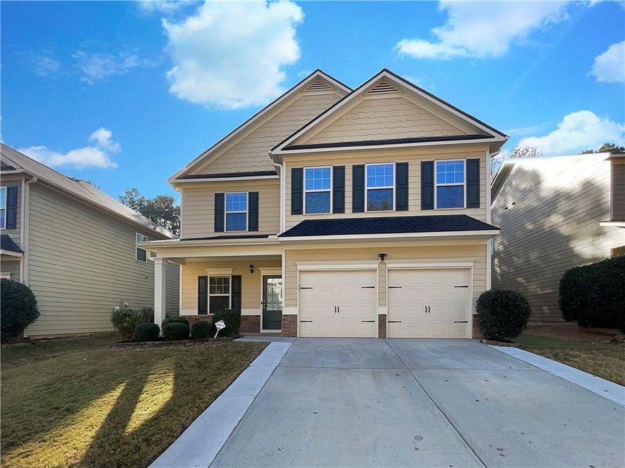 Seller may consider buyer concessions if made in an offer. Welcome to this beautifully updated home. The neutral color paint scheme and fresh interior paint create a calming atmosphere. The living room features a cozy fireplace, perfect for chilly evenings. The kitchen is a chef's dream with a center island, accent backsplash, all stainless steel appliances. The primary bedroom boasts a walk-in closet and an en-suite bathroom with double sinks, a separate tub, and shower. Partial flooring replacement and new appliances add a modern touch. Outside, enjoy a patio and a fenced-in backyard for privacy. This home is a must-see!. Included 100-Day Home Warranty with buyer activation