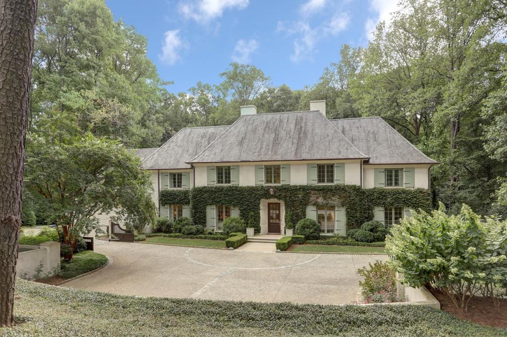 Come home to this exquisite gem in the heart of Tuxedo Park! This Benecki crafted masterpiece boasts Old World elegance with today's features. Chef's kitchen and gathering rooms overlook magnificent landscape, gardens, and pool. Relax outdoors before retiring to the stunning master suite on main. Upper floors boast a second master, generous bedrooms, a bonus suite and bath, and large laundry. Fantasies are made in the playroom's life sized ship! Terrace level stuns with a theater, wine celler, wet bar, and ample space for entertaining, and for storage. Do not miss!