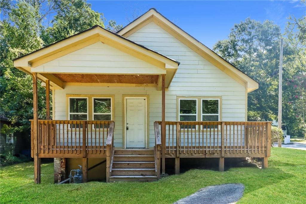 Investor opportunity in the heart of historic Hunter Hills—welcome to 95 Arcadia Circle NW. This 3-bedroom, 2-bathroom home offers nearly 1,800 square feet of living space on a generous 0.26-acre lot, and it's being sold strictly as-is, where-is. Some renovation work has already begun, giving buyers a valuable head start toward transforming this property into a stunning residence or profitable investment. With its original 1940s charm and a layout full of potential, this is an ideal project for experienced investors, builders, or homeowners ready to bring their vision to life. Located just minutes from the Atlanta Belt Line, MARTA, parks, and the Westside’s growing list of amenities, this home sits in a neighborhood full of revitalization and strong resale potential. Nearby renovated homes have recently sold for significantly higher, making this an excellent opportunity to buy low, build equity, and benefit from rising home values. Whether you're planning a full flip, a rental, or a personal renovation, 95 Arcadia Circle offers the space, location, and bones to support a wide range of possibilities. Don’t miss your chance to unlock the potential in one of Atlanta’s most promising neighborhoods.