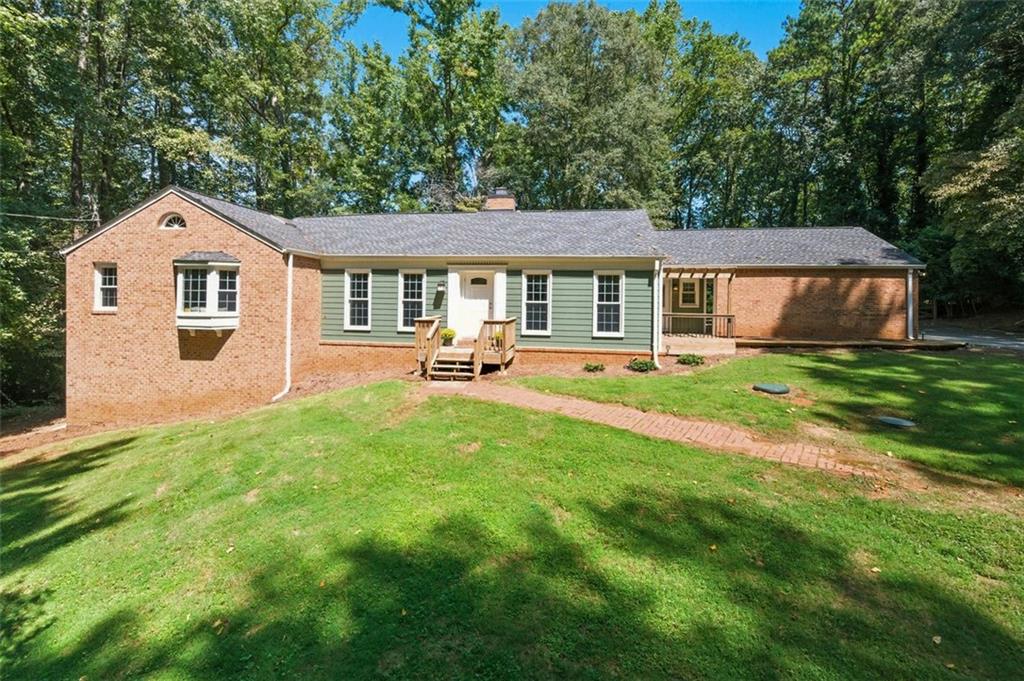 Tucked away on 1.6 private acres, this charming craftsman-style home offers the perfect blend of peaceful living and unbeatable convenience, just minutes from shopping, dining, movie theaters, parks, and historic downtown Acworth! Enjoy seasonal views of the nearby lake and scenic backyard views ot the prestigious Cobblestone Golf Course.
Daily visits from deer and birds make this a nature lover’s dream, and the large fenced yard is ideal for pets or gardening. The home sits on a full unfinished basement with one finished room, great for extra space or future potential.
Inside, you'll love the spacious kitchen and dining area made for entertaining, along with beautiful original woodwork and architectural details throughout. Many major systems have been updated since 2019, including the roof, HVAC, water heater, and new electrical panel box. A custom shed (2018) also adds convenient storage for outdoor gear.
Quiet, cozy, and full of character, this home feels like a private retreat while offering easy access to Hwy 41 and I-75. Don’t miss the chance to own a one-of-a-kind property that combines nature, charm, and convenience in the heart of Acworth.
