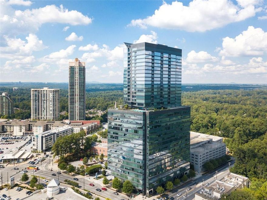 Experience elevated living at its finest in this corner residence on the 21st floor of the Ritz-Carlton Residences, Buckhead — Atlanta’s most prestigious address. This two-bedroom, two-and-a-half-bathroom condominium blends timeless sophistication with modern luxury, offering sweeping skyline views and the impeccable service synonymous with the Ritz-Carlton name.

Step inside to a light-filled open layout wrapped in floor-to-ceiling windows, where elegant finishes and refined details set a tone of quiet grandeur. The gourmet kitchen features top-of-the-line appliances, custom cabinetry, and stone countertops — perfect for both everyday living and entertaining. The primary suite is a private retreat with a spa-inspired bathroom and generous walk-in closet, while the secondary bedroom suite provides comfort and privacy for guests.

Residents enjoy world-class amenities, including a 24-hour concierge and valet, heated pool, state-of-the-art fitness center, club lounge, and luxurious spa services. Every detail of the Ritz-Carlton lifestyle is designed to provide an unmatched level of comfort, security, and convenience.

Located in the heart of Buckhead, you’re steps from Atlanta’s finest dining, designer shopping, and cultural experiences — all complemented by the elegance and service of the Ritz-Carlton brand.

Discover refined urban living — where every day feels like a five-star escape.