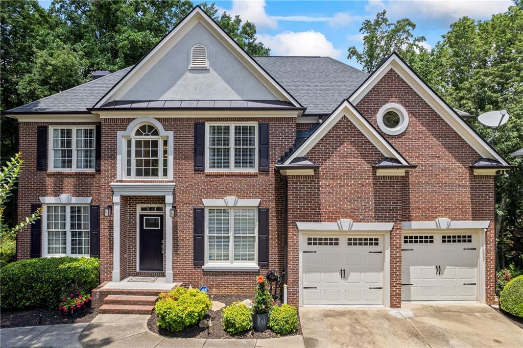Welcome to this beautifully updated 5 bedroom, 3.5 bathroom home nestled in the prestigious Hamilton Mill community. The moment you step inside the two story foyer, you will feel the open flow of this exceptional space. The large private office, with custom french doors and exquisite formal dining room are just the beginning of all that make this home seamlessly functional and versatile. At the heart of the home is a true chef’s kitchen, boasting quartz countertops, ample cabinet space, custom built pantry, and a 6 burner Viking gas range—a dream for culinary enthusiasts. The oversized enclosed deck is the perfect spot to enjoy your favorite beverage while taking in the gorgeous views and sounds of nature. Truly indoor-outdoor living at its best. Upstairs, the home continues to impress. The luxurious oversized primary suite, featuring stunning crystal chandeliers, a custom built extra large shower, jetted whirlpool tub, custom built vanity, and huge walk-in closet- all come together to create a perfectly peaceful retreat. Downstairs, the newly renovated finished basement feels more like a second home! Open concept; living room, full kitchen complete with modern finishes and ample cabinet space. Additionally, there is a large bedroom, a flex room, a second laundry room, and full bathroom with shower-tub combo. The HVAC unit for this level has also been equipped with an air purifier. The flagstone walkway leading to the private patio and private entrance makes this the perfect space for entertaining guests or multi-generational living. Pictures do not do this home justice- must see! Located in one of the area’s most highly sought-after communities, residents of Hamilton Mill enjoy access to a remarkable lineup of amenities: 20 lighted tennis and pickleball courts, basketball and volleyball courts, soccer and softball fields, two resort-style pools, complete with water slide, a children’s play area, playground, fitness center, and event-ready clubhouse, fully stocked lake for fishing or relaxing, and for the golf lover in the family—Hamilton Mill Country Club; with two restaurants, and a private, scenic par-72 course that offers a peaceful escape just minutes from a large variety of shopping, dining and I-85. Don’t miss the opportunity to own this rare gem that combines luxury living, resort-style amenities, and convenience. Schedule your showing today!