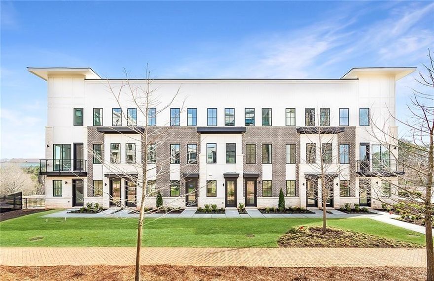 Welcome to this incredible opportunity to own your new stacked condominium in Monte Hewett's newest neighborhood in walkable Alpharetta, Findley Row. This low maintenance living and high-end luxury is a true lifestyle opportunity to find your new home built by the same builder as Avalon, Halcyon and many other well-known neighborhoods. Located directly on the Alpha Loop, this dynamic and transformative project for Alpharetta, is not just a path but a place that connects a series of destinations that were designed to enhance the quality of life for everyone who lives, works or enjoys the area. Connecting Findley Row to downtown Alpharetta and to Avalon, which is the hub of local culture and activity that delivers the luxury of the modern South, you can shop, eat, watch a movie, this upscale destination brings together Southern charm with a lot of fun!  Located a mile and a half from Ameris Bank Amphitheatre, this unique setting for music lovers sitting is 45 acres and seats 12,000 people between the under roof and open lawn seating. You can see why this amazing location was selected for these great condos where the exterior is maintained for you while the interior details are just what you will love with amazing designs and higher end than any other new construction in the area. You will enjoy White Oak Hardwood floors throughout the home, Quartz countertops in the Kitchen and bathrooms, Bell custom cabinetry throughout the home, tile to the ceilings in the bathrooms and so much more. Ideal for entertaining on the main level, this completely open floor plan will be enjoyed from the Family room to the Kitchen, Dining and outdoor covered patio. The Kitchen features a large island with plenty of room for entertainment and great storage space.  Upstairs are two generously sized bedrooms both with walk-in closets and private ensuite baths. The professionally designed bathrooms are the perfect color combinations with quartz countertops, gorgeous tile work, frameless shower doors, upgraded faucets and lights. The oversize two-car tandem garage offers private and convenient parking with tall ceilings that are perfect for storage and an electric car charger outlet. Findley Row is located in the Northwinds Summit that will feature a luxury hotel, retail, dining and office space, as well as very convenient access to GA-400. With over 250 shops and 200 restaurants within a 5-mile radius, there are always things to do in Alpharetta! Contact us to schedule a private showing and experience the exceptional lifestyle you will enjoy in Findley Row!