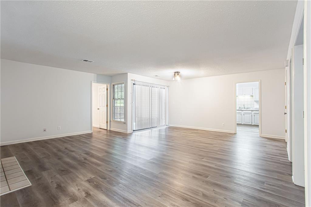 Great Location & Quiet Living! Come see this 3BD/2BA condo in one of Atlanta's best kept secrets, the Gardens! This unit is perfectly located at the Perimeter just steps to grocery stores, restaurants, offices Perimeter Mall, & MARTA. Neighborhood amenities include 4 lighted tennis courts, pool, 24 hour gym, clubhouse, and 2 beautiful lakes on 7 acres. Easy access to 285 & 400 to get anywhere. Unit features granite countertops, outdoor patio, and great community amenities! Laundry machines included. All furniture can stay with unit at no extra cost.