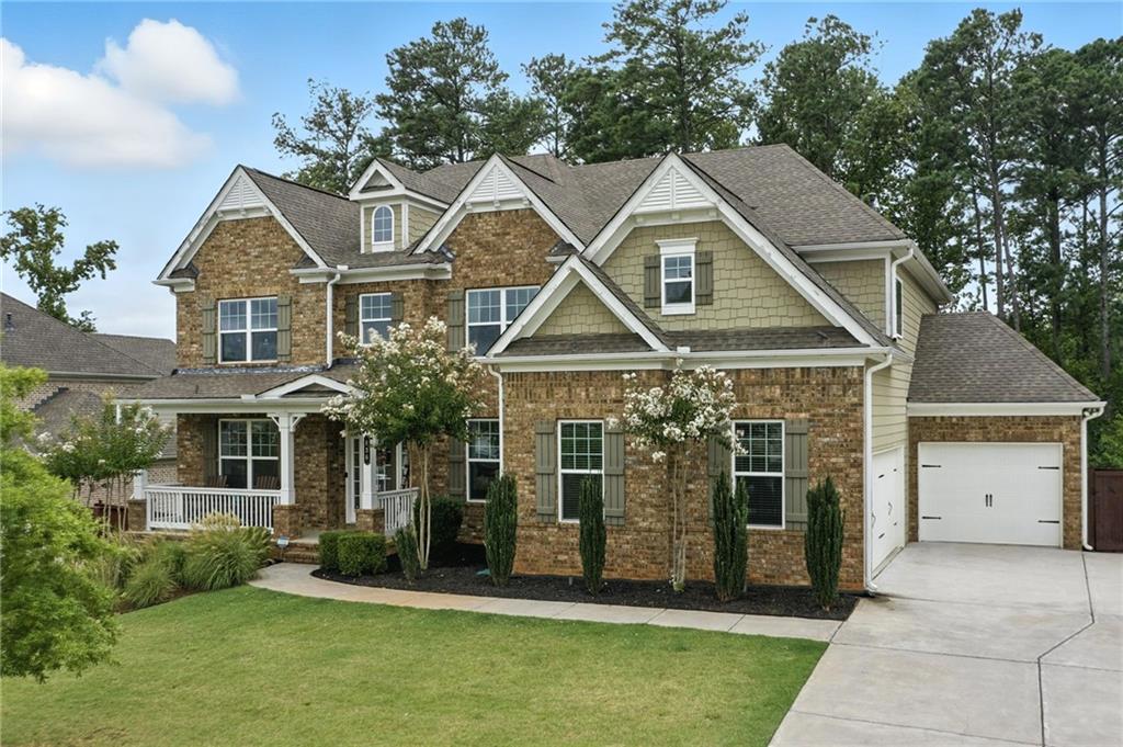 Located in a highly sought-after neighborhood in Woodstock and just minutes from the vibrant downtown area, this stunning home offers the perfect blend of comfort, functionality, and style—all within one of the area's top-rated school district!
Step inside to soaring ceilings and gorgeous hardwood floors throughout the main level. The two-story great room is flooded with natural light from floor-to-ceiling windows and opens seamlessly to the kitchen, featuring granite countertops, stained cabinetry, and a spacious island—ideal for entertaining. A separate dining room offers a formal touch, while the main-level office and additional enclosed flex space are perfect for a second office, playroom, or creative studio.
Guests will appreciate the bedroom and full bath on the main floor. Upstairs, you’ll find an oversized owner’s suite with a luxurious bathroom and direct access to the laundry room for added convenience. Three additional bedrooms provide ample space, including one with a private en-suite and two connected by a Jack-and-Jill bath.
The home sits on a full, unfinished daylight basement with walk-out terrace level—ready for your customization. Enjoy outdoor living on the extended lower deck overlooking the fully fenced backyard, ideal for play, pets, or entertaining. A three-car garage and oversized driveway provide plenty of parking for guests.
Don't miss this incredible opportunity - homes like this don't last long!