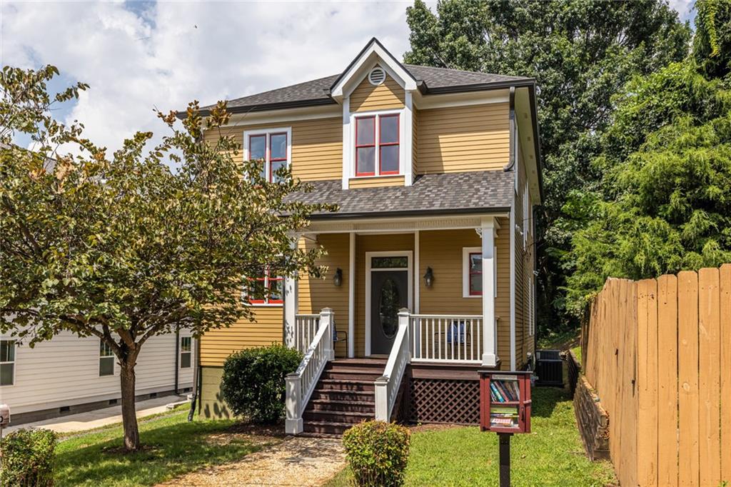 Classic Charm Meets Modern Comfort in Summerhill – Double Lot with Skyline Views!
Welcome to this lovely 2002-built home in the heart of red-hot Summerhill! Sitting on a rare double lot with one of the largest yards in the neighborhood, this home combines classic Grant Park-inspired style with modern updates and convenience—including off-street parking with EV charging capability.
The inviting front porch on quiet Bill Lucas Drive sets the tone, leading into a light-filled, open floor plan designed for everyday living and entertaining. The spacious living room features gleaming refinished hardwoods, crown molding, generous windows, and a wood-burning fireplace. A covered back deck extends the living space and overlooks the expansive yard and skyline views.
The beautifully updated kitchen shines with new countertops, tile backsplash, sink, faucet, and freshly finished hardwoods, plus a stainless a steel dishwasher and gas range. The kitchen flows seamlessly into the dining and living areas for effortless entertaining.
Upstairs, three bedrooms all feature brand-new carpet. The oversized primary suite boasts skyline views, a walk-in closet, renovated en suite bath with double vanity, and access to its own private covered porch. Two secondary bedrooms share a Jack-and-Jill bath.
Additional highlights include:
Roof replaced in 2023
HVAC systems (2019 & 2016)
Off-street parking pad with alley access
Value-added second lot ($80–90k per appraiser)
Location perks: Less than a block to Cheney Field (1996 Olympic practice track) and minutes to Phoenix Park, Ormewood Park, Grant Park, and the soon-to-be-completed Atlanta BeltLine Southside Trail. Walk to Summerhill’s vibrant dining and shopping scene, the new Publix, Ace Hardware, and more. Easy access to I-20, I-75/85, and Atlanta Airport. Zoned for highly regarded Parkside Elementary and a short walk to ANCS.
Don’t miss this rare opportunity to own a move-in ready home with modern systems, classic character, and an unbeatable double lot in one of Atlanta’s most exciting neighborhoods!