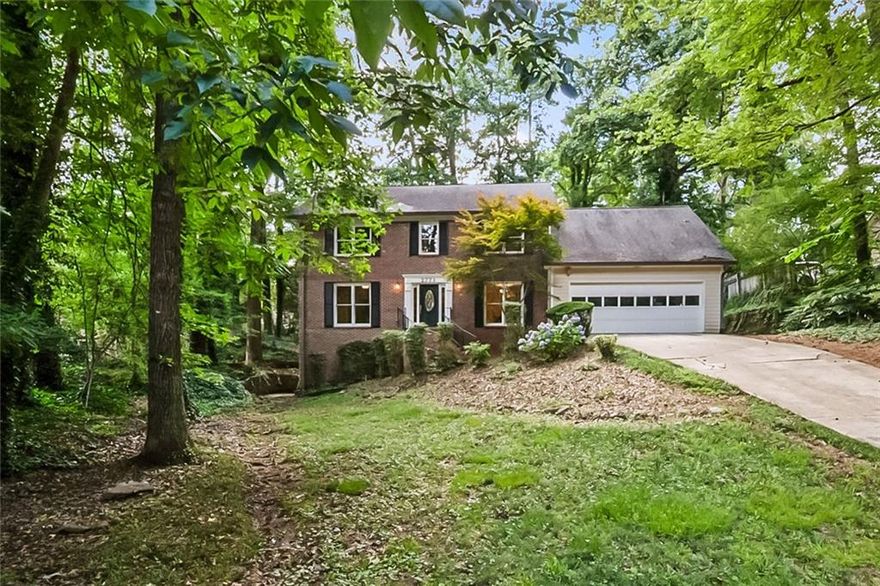 Stately Traditional Two-Story in Sought-After Swim/Tennis Community Located on a private street in a highly desirable neighborhood, this classic brick home combines timeless charm with modern upgrades. Situated in a vibrant swim/tennis community just minutes from shopping, award-winning schools, and  downtown Duluth, this home offers the perfect blend of lifestyle and convenience. The spacious floor plan features a large primary suite and an additional room ideal for a nursery or home office. The heart of the home is the updated chef’s kitchen, complete with granite countertops, a sleek vent hood, and an eat-in breakfast area — perfect for everyday living or entertaining. Enjoy the comfort of a formal living room, dining room, cozy family room, and a separate laundry room with utility sink. Step outside to a serene screened-in porch that overlooks a private, wooded backyard — a peaceful retreat for your morning coffee.
The basement offers a finished bonus room, a dedicated workshop, and unlimited potential for future customization. Community amenities include swimming, tennis courts, and a picturesque lake — all within walking distance.Don’t miss this incredible opportunity to own a beautifully maintained home in one of Duluth’s most desirable communities!