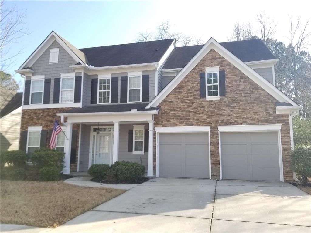 THIS BEAUTIFUL 2 STORY CRAFTSMAN STYLE HOME HAS 3 BED AND 2.5 BATH. HARDWOOD FLOORS, LARGE OPEN EAT IN KITCHEN WITH TILE BACK SPLASH AND ISLAND OPENS TO YOUR FAMILY ROOM WITH FIREPLACE. LIVING & DINING ROOM WHICH FEATURES CHAIR RAIL SHADOWBOX AND CROWN MOLDING. OVERSIZED MASTER WITH A DOUBLE VANITY, PRIVATE WOODED FENCED BACKYARD. QUIET NEIGHBOORHOOD. 5MIN DISTANCE TO MALL OF GA. EASY AND CONVENIENT ACCESS TO SHOP, RESTAURANT, PARK, AND I-85 AND 316.