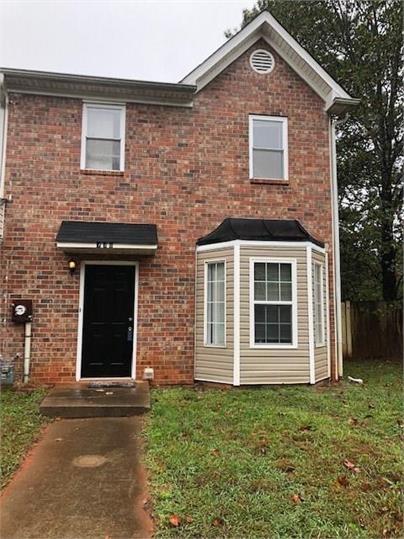 Welcome to your dream home nestled in the vibrant community of Austell! This beautifully updated 2-bedroom, 2.5-bathroom townhome is a perfect blend of comfort and style, tailored for modern living. Freshly painted with a warm color palette, each inch radiates charm and elegance. As you step inside, you'll be greeted by an inviting open-concept layout adorned with stunning laminate floors that flow effortlessly through the main living areas. Picture cozy evenings spent by the crackling fireplace in your spacious living room — ideal for entertaining friends or enjoying quiet nights at home. Enjoy this spacious kitchen. Featuring ample cabinetry and counter space, along with a bright breakfast area bathed in natural light. Retreat to the second floor where two generous bedrooms await, each featuring plush carpeting that adds warmth and comfort. With two full baths plus an additional half bath on the main level