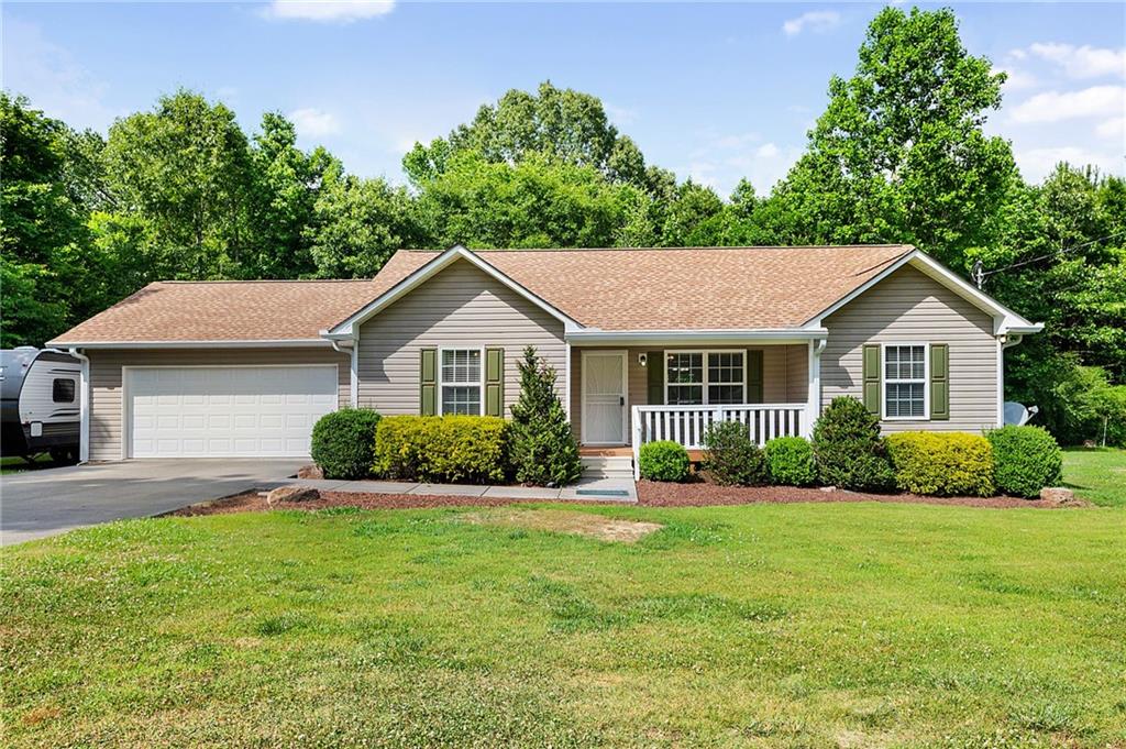 Looking for country living only minutes from downtown Calhoun, shopping and schools, then this is perfect for you! A Ranch home with private back yard. This 3 bedroom, 2 bath home has hardwood floors and ceramic tile in both bathrooms. Master bath has a handicap shower which will accommodate a wheelchair. There is also a handicap ramp in the garage which can be removed if not needed. All kitchen appliances stay with the house.