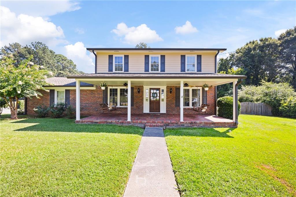 Welcome home to this beautiful property in the heart of Rome! Situated on a spacious corner lot, this home offers the feel of your own private oasis. The inviting covered front porch is the perfect spot to relax on a swing and enjoy the fresh air and morning sunrises. Inside, you’ll find a warm, well-maintained interior that reflects the love and care this home has received over the years. The foyer leads into a cozy living room and a versatile flex space—perfect for a home office, workout area, or kids' playroom. The kitchen is open and spacious, ideal for family gatherings, with plenty of cabinet storage and a breakfast bar for quick meals. The large dining area flows into a huge family room with enough space to comfortably host the entire crew. Upstairs features two generously sized bedrooms, a guest bathroom with a tub/shower combo, and a large primary suite with a walk-in closet and private bath with a walk-in shower. Step outside to a brand new deck overlooking the large, flat, fully fenced backyard—complete with a storage shed for your lawn tools and equipment. The oversized driveway adds even more value, offering the perfect setup for a game of one-on-one basketball with a hoop already in place. Don’t miss out on this move-in ready home! Conveniently located near shopping, dining, local universities, and entertainment. Call today to schedule your private showing!