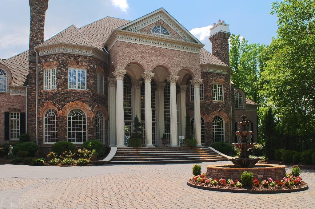 Incredible home in the St Ives Country Club! Home features private gated entrance and unique location with Golf Course and Chattahoochee River views. Interior includes Nine Bedrooms, Elevator to all levels and exquisite upgrades throughout. Property features large swimming pool with hot tub, cabana and beautifully landscaped courtyard. An absolutely amazing home you must see to believe!