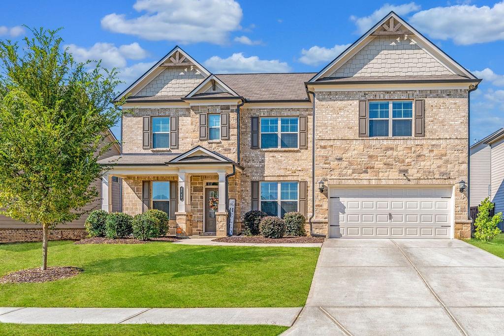 NEW PRICE ----NEW OPPORTUNITY | 2.625% ASSUMABLE RATE --- Central Park Luxury in the Heart of Gwinnett County!!!! Welcome home to this beautifully appointed 5-bedroom, 3-bath residence in the sought-after Central Park community-where modern design meets everyday comfort. With its generous layout, stylish upgrades, and private outdoor retreat, this home is perfectly crafted for both entertaining and unwinding. The open main level immediately impresses with gleaming hardwood floors, soaring natural light, and a seamless flow between living and dining spaces. A formal dining room sets the stage for celebrations, while the expansive family room with coffered ceilings adds warmth and sophistication. At the heart of it all, the chef's kitchen features custom gray cabinetry, stainless steel appliances, and an oversized island with breakfast bar-perfect for gatherings large or small. Also on the main floor, a spacious bedroom and full bath offer the flexibility of a guest suite, home office, or gym. Upstairs, a versatile loft creates endless opportunities for a playroom, media lounge, or home library. Retreat to the primary suite, where a private sitting area and spa-inspired bath with soaking tub, glass shower, dual vanities, and a walk-in closet provide the ultimate in comfort. Three additional bedrooms share a full bath, ensuring space for family and guests alike. Step outside to enjoy a covered patio overlooking the fenced backyard-your own private oasis for al fresco dining, quiet evenings, or lively celebrations. Ideally located minutes from Loganville Town Centre, boutique shopping, dining, parks, and scenic trails, this home pairs luxury with convenience in one of Gwinnett County's most coveted neighborhoods. Don't miss this opportunity-schedule your private showing today and experience Central Park living at its finest, now offered at a NEW PRICE AT THE BEST RATE!