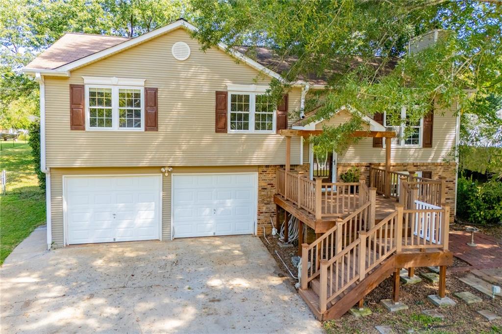 Spacious 5-bedroom home in a well-loved neighborhood with extensive updates throughout. Fresh paint, new door hardware, switches, outlets, vent registers, and LED lighting give a modern touch. The kitchen features painted cabinets with new hardware, new granite countertops, new undermount sink, and new faucet, plus all-new appliances. Bathrooms include new vanities, mirrors, and toilets, with a garden tub in the basement bath. Stairs have refinished treads and painted rails. Step outside to a screened-in porch overlooking the fenced backyard on a nearly half-acre, level lot-perfect for relaxing or entertaining. Exterior improvements include a refreshed front deck, resurfaced shutters, pressure-washed exterior and driveway, and a newer sump pump. Move-in ready inside and out.