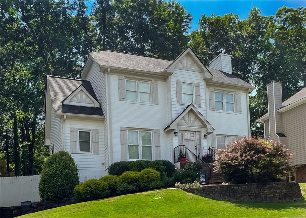 Newly renovated home in sought after Peachtree Ridge cluster. Close to 1-85, shopping, restaurants, and Gas South Arena, New windows, doors, roof, and floors! Every light fixture and hardware has been meticulously chosen to create a unique home with classic style. Hardwoods throughout main level with a dinining area opening to a 13' eat in granite island.
Warm up by the living room fireplace and then walk out French Doors to the rear porch with tounge and groove ceiling, two giant fans, and Trex decking. Relax in the hot tub overlooking the private back yard.
Second floor offers a primary bed with designer paint, paneling, and tray ceiling. Basement protected with a whole house drainage system surrounding the entire foundation to ensure moisture is kept out.
HVAC and water heater updated to provide years of service.
Basement finished with two additional beds and a full bath.
50 Amp Electric car charger.