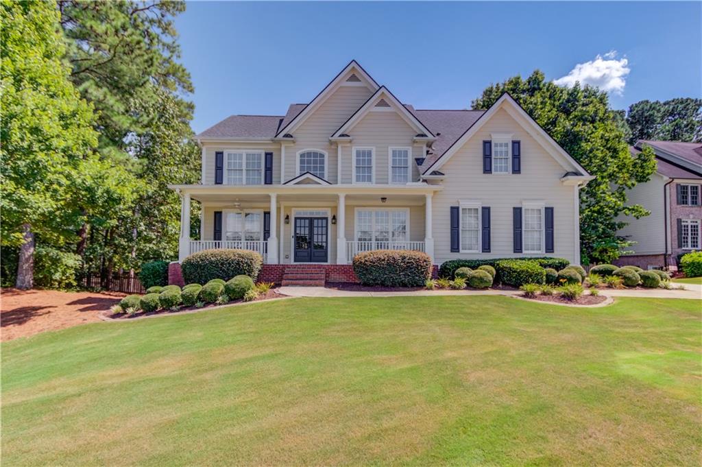 Your Private Oasis Awaits in One of Georgia’s Most Coveted Communities!
This spacious 5-bedroom, 5-bathroom gem with TWO flex spaces and a movie room in the finished basement is located in one of Georgia’s most sought-after school districts and offers the perfect combination of luxury, comfort, and convenience.
Lovingly maintained by the original owners, this move-in ready home features major upgrades including a new HVAC unit, newer roof, and newer water heaters, providing peace of mind and efficiency for years to come.
You don't want to miss this private backyard oasis – a true entertainer’s dream! Enjoy summer days by the sparkling pool, unwind on the gorgeous deck, and take in the professional landscaping and lighting that brings the space to life. The fenced backyard offers privacy and security, perfect for pets and play. Just off the pool, step inside to a convenient space featuring a kitchenette and a wine fridge. This space is ideal for storing all your drinks, snacks and pool accessories.
Located on a private corner lot in this desirable swim/tennis community, this home offers access to golf, clubhouse, pickleball, tennis and resort-style amenities. Enjoy quick access to I-85, the Mall of Georgia, and endless shopping, dining, and entertainment options – all while coming home to peace and privacy.
Don’t miss your chance to own this exceptional home that truly has it all – space, upgrades, location, and community!