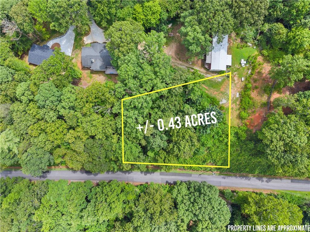 This exceptional residential lot at 6317 Falcon Lane is a rare opportunity to create your custom dream home just outside the highly desirable Timberidge Estates gated community. Perfectly situated near the shores of Lake Lanier, this property offers the ideal blend of privacy, natural beauty, and resort-style amenities.
As part of Timberidge Estates, you’ll enjoy access to a sparkling pool, well-maintained tennis courts, and a private community boat dock—providing the ultimate Lake Lanier lifestyle.
With its prime location, you’ll have the best of both worlds: peaceful, private living surrounded by nature, plus easy access to all the recreation and relaxation Lake Lanier has to offer.
Don’t miss out on this incredible chance to own land in one of the most sought-after areas near Lake Lanier—start envisioning your dream home at 6317 Falcon Lane today!
