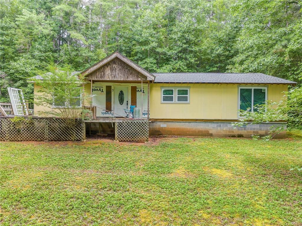 Investor Special with Endless Potential on 2.11 Acres!
Don’t miss this opportunity to make this 3-bedroom, 2-bath home your own! Nestled on a private 2.11-acre lot, this property is perfect for investors, DIYers, or anyone looking to customize their dream home. The hard part is already done – enjoy the benefits of a brand-new roof, windows, and doors, with most materials on-site and ready to complete the build. Featuring an open floor plan ideal for modern living, this home offers plenty of space and natural light. Located just 10 minutes from Downtown Ellijay and Chatsworth, you'll love being close to shopping, restaurants, wineries, and a variety of outdoor activities.
An outbuilding adds additional storage or workspace, and the property offers a peaceful, private setting.
Sold As-Is, but the seller is open to completing the project if you’re in need of a builder.
Endless possibilities await—come see the potential today!