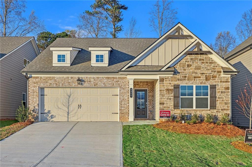 Brookfield This new construction home offers 3 Bedrooms and 3 Bathrooms with a Flex space for an office. Entering this stunning home with a spacious guest suite on the main level with access to a full bath, the flex space offers privacy with beautiful French doors. The great room allows you to relax by the 48" electric illusion fireplace with shiplap surround floor to ceiling. This inviting great room opens to an amazing gourmet kitchen to cook your favorite meals, plenty of barstool seating on the oversized granite island. The kitchen offers a walk-in pantry, and a mud room to drop and go. The breakfast area is off the the kitchen with access to the back covered porch where you can relax and unwind. Upstairs has an incredible Loft area with a bedroom and full bath up as a private retreat for family or friends. Primary Suite on the main where the Primary bath provides a luxurious 7 ft Shower with dual showerheads and an oversized walk in closet. The Laundry room on the main for easy access. Also included is the SMART HOME PACKAGE, featuring cutting-edge technology such as Ring Doorbell, Echo Show 8", Ecobee Thermostat, and Kwikset Halo Smart Front Door Lock. The WIFI-enabled garage door opener adds an extra layer of convenience. Energy Star Rated Home Stock Images - Under construction. Please contact for more details on the current incentives- these won't last long.