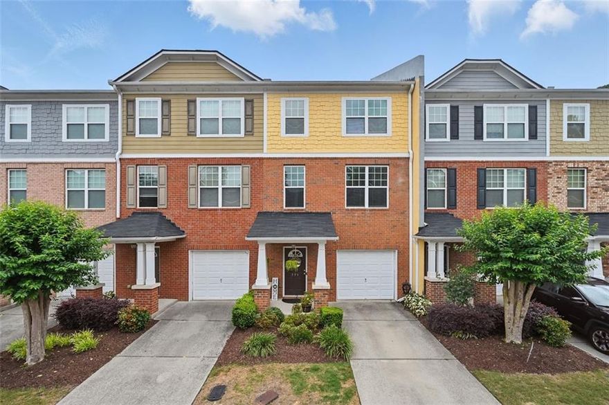 Welcome to 771 Tulip Poplar Way, a beautifully maintained townhome in a quiet, well-kept community in Lawrenceville! This charming home features spacious 9' ceilings that create an open, airy feel throughout. You'll love how the main level flows seamlessly from the living room to the dining area and kitchen, perfect for everyday living and entertaining. The HOA takes care of all exterior maintenance and landscaping, so you can enjoy low-maintenance living. The neighborhood is peaceful, safe, and full of respectful neighbors. Conveniently located just minutes from Hwy 316, I-85, and vibrant downtown Lawrenceville, you'll have quick access to great restaurants, shops, and more. Whether you're a first-time buyer or looking for a great place to call home, this one checks all the boxes!